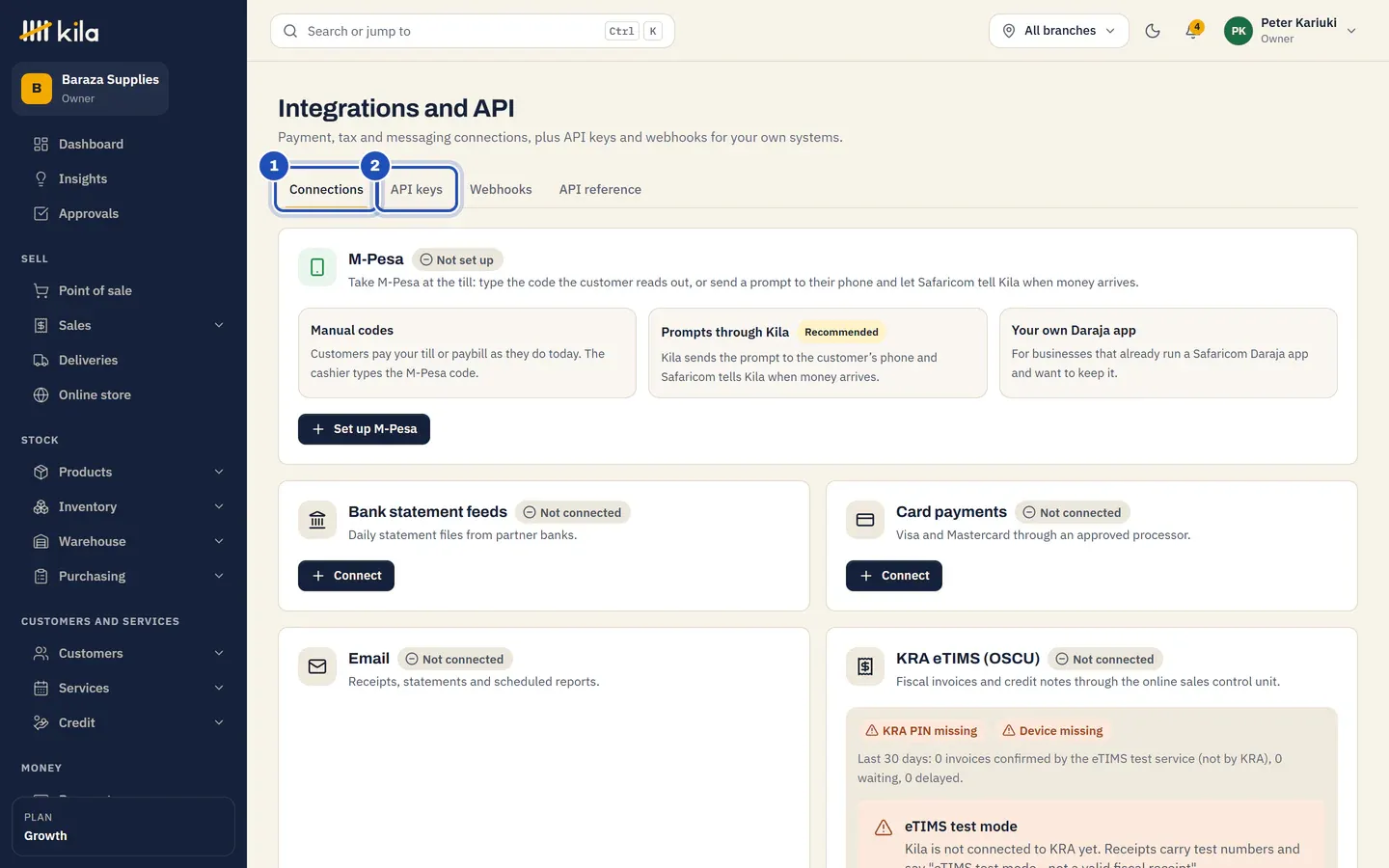 Integrations and API at Baraza Supplies: the Connections tab (1) with M-Pesa not set up, Bank statement feeds, Card payments and Email not connected, and the API keys tab (2).