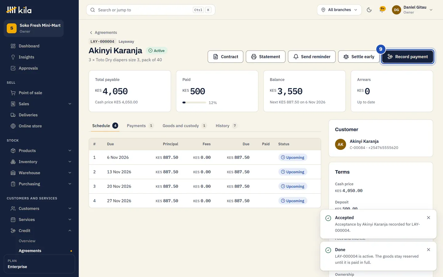 The layaway running: total payable KES 4,050, KES 500 paid, balance KES 3,550 with the next KES 887.50 due, four weekly instalments upcoming, and Record payment (9).